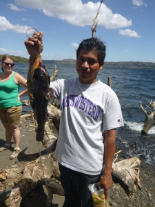 A fisherman shows us his catch