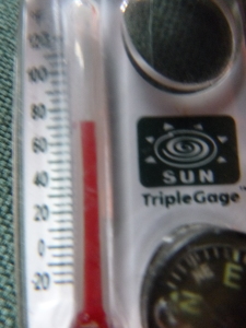 Zoe's LL Bean thermometer, compass, magnifying glass zipper pull is being a little generous here.  It was in the low 60s when we started our trip.