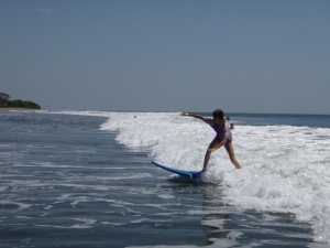 Zoe surfs