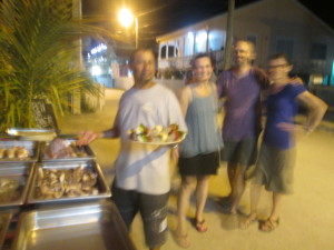 Happy parents by the seafood vendor