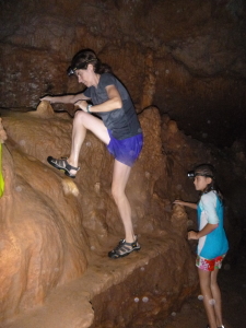 Scrambling up the cave walls