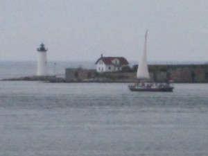 The Gundalow and Constitution light as seen from Fort McLary.